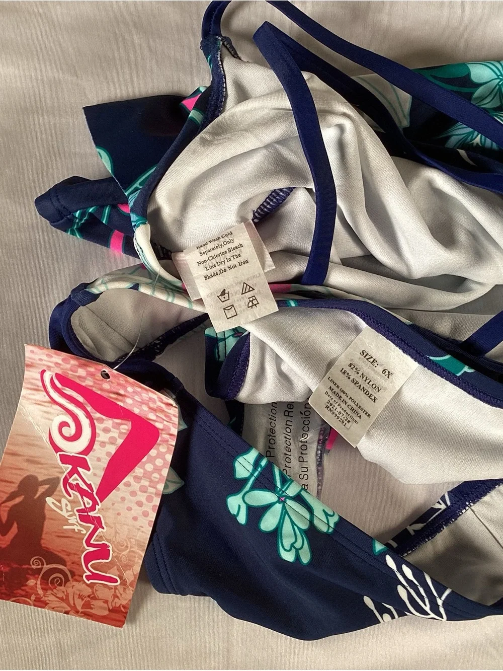 KANU SURF Girls Navy Floral Tankini with Teal & Pink Accents